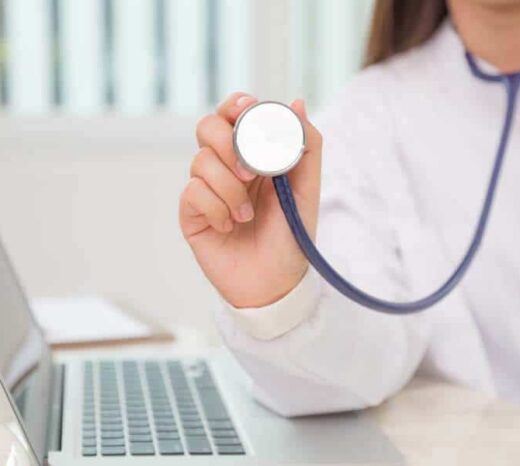 Doctor with stethoscope in the hands